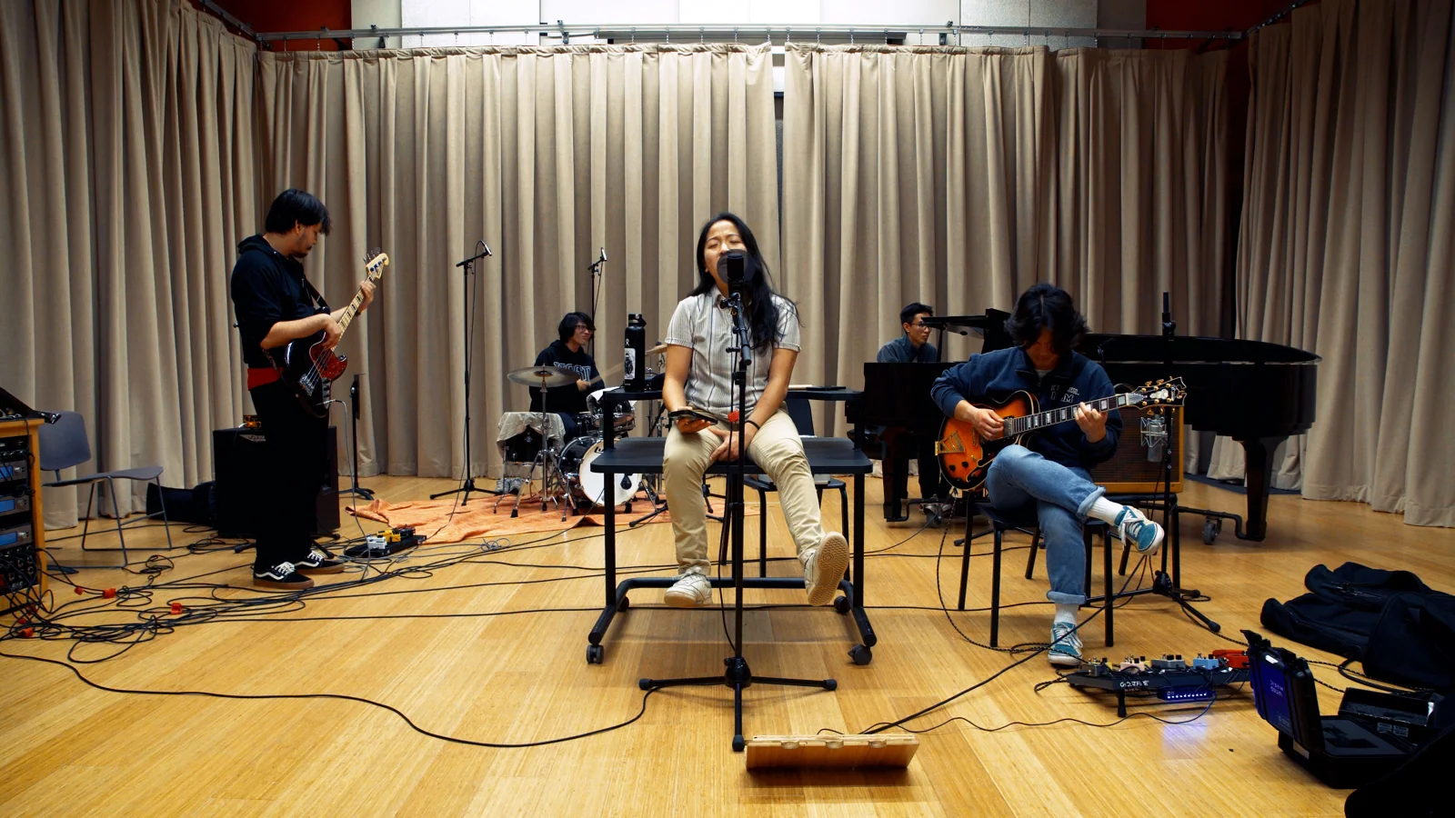 The musicians recording Coffeeshopgirl in an ensemble